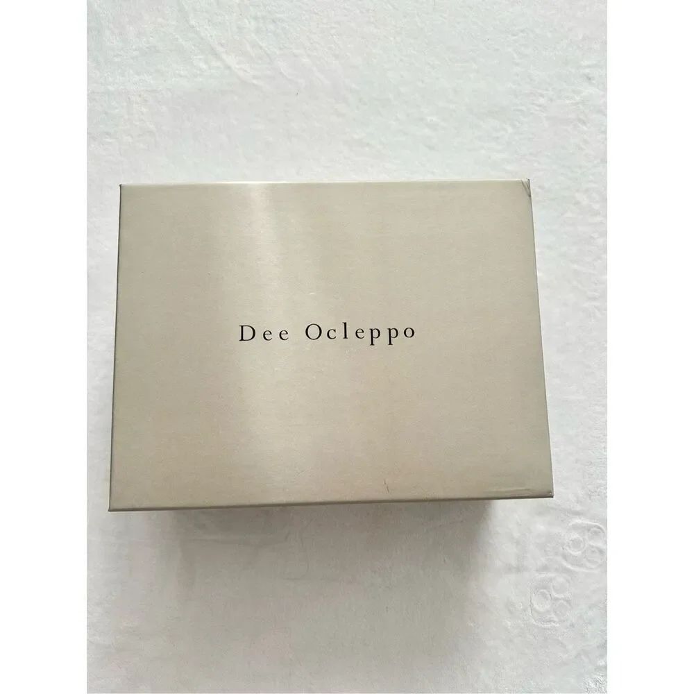 Dee Ocleppo - grey and pink empty shoebox with dust bag